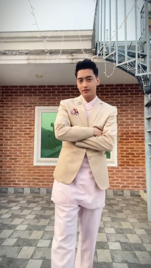 Green t-shirt with The Band graphic